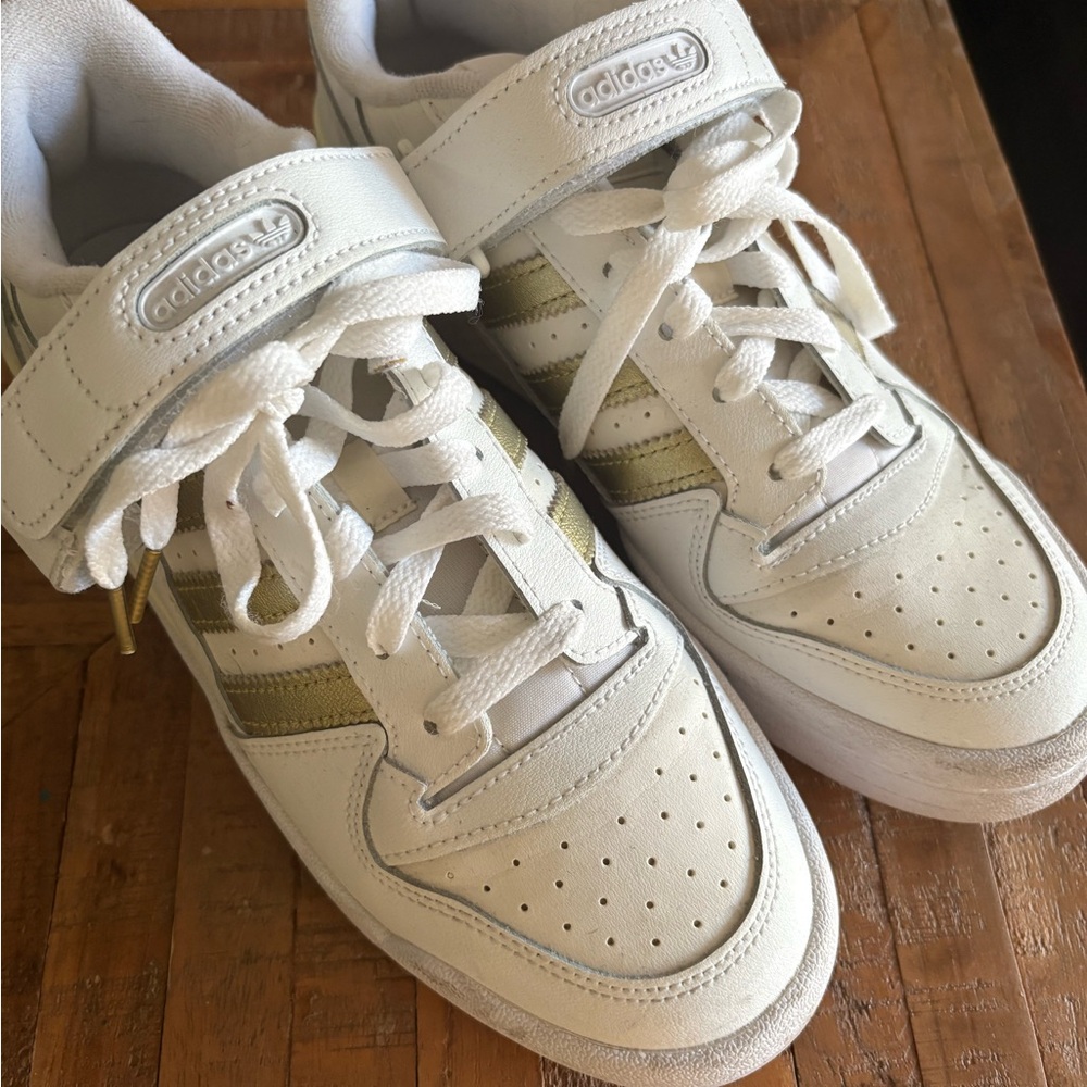 Adidas Womens Sneakers in White with Gold Stripes. Almost brand new 8.5